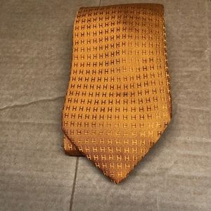 Hermès h faconnee silk tie orange gold